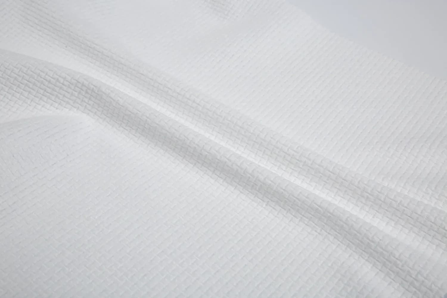 Eco-Pure 100% viscose biodegradable spunlace EF pattern white 50gsm interlocking weave sample