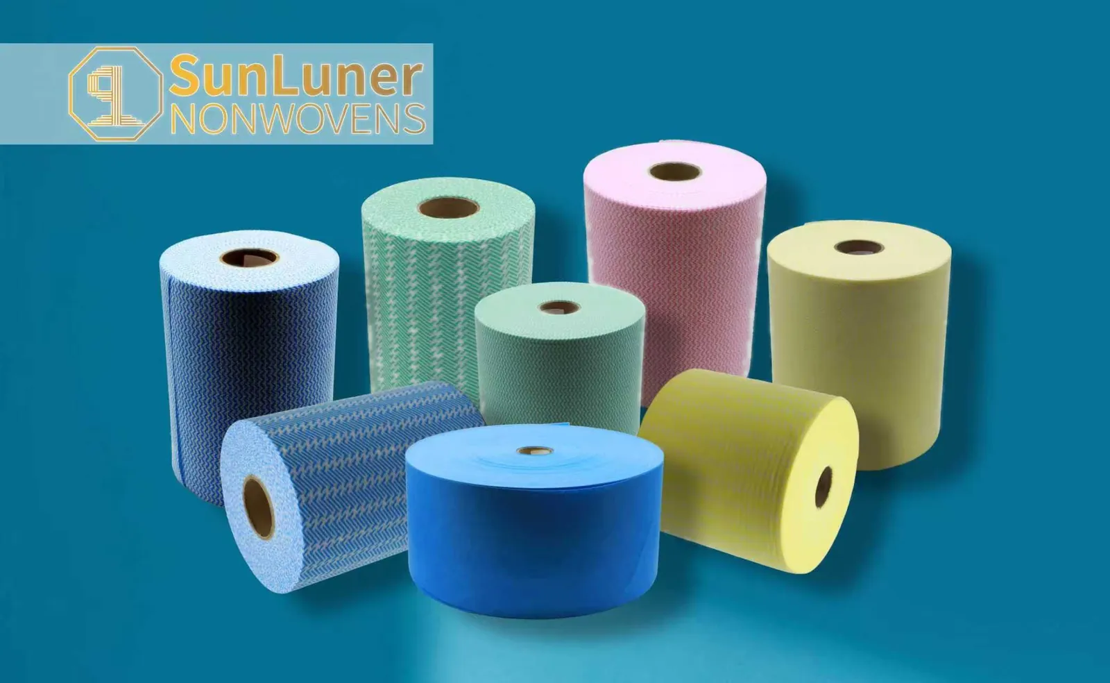 Finished multi-purpose wipes in blue, green, and yellow color-coded rolls